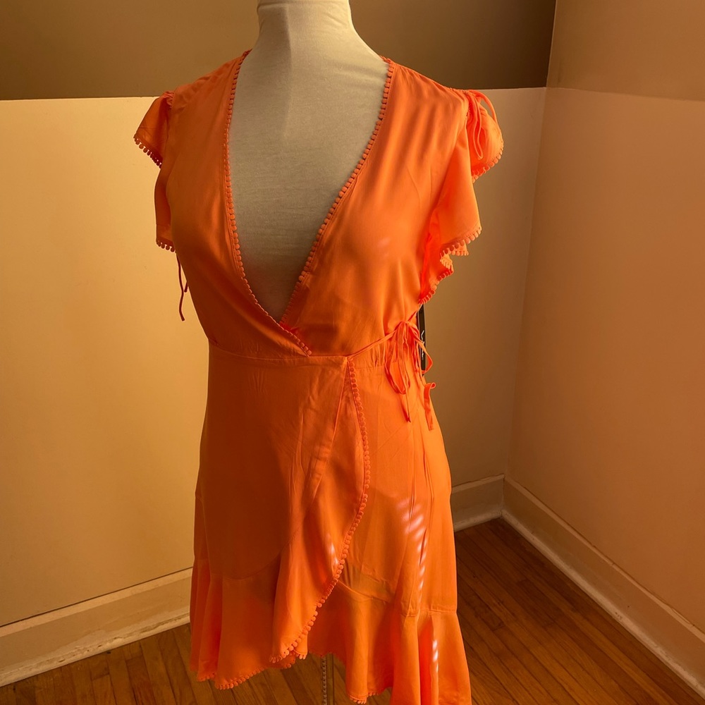 Lulus coral color wrap dress.  Size small